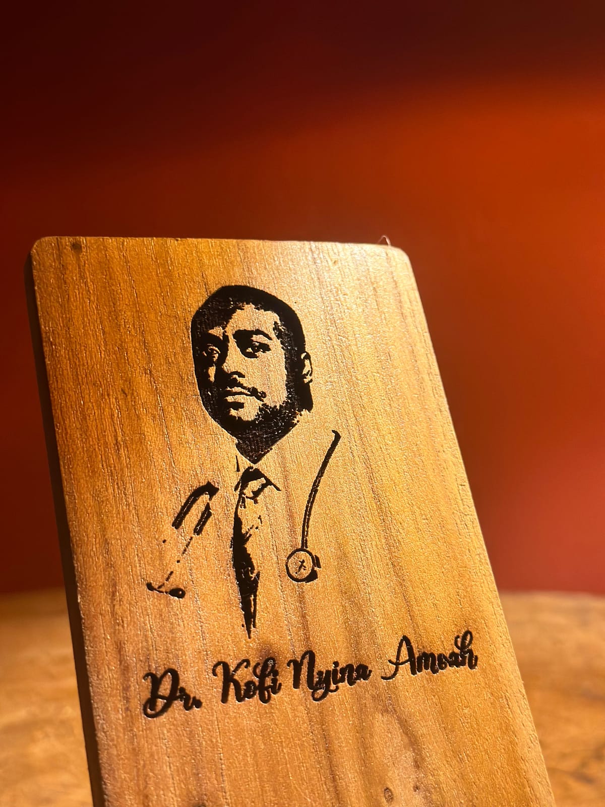Doctor Engraved Phone Stand — handcrafted wood by Mahogana in Accra, Ghana